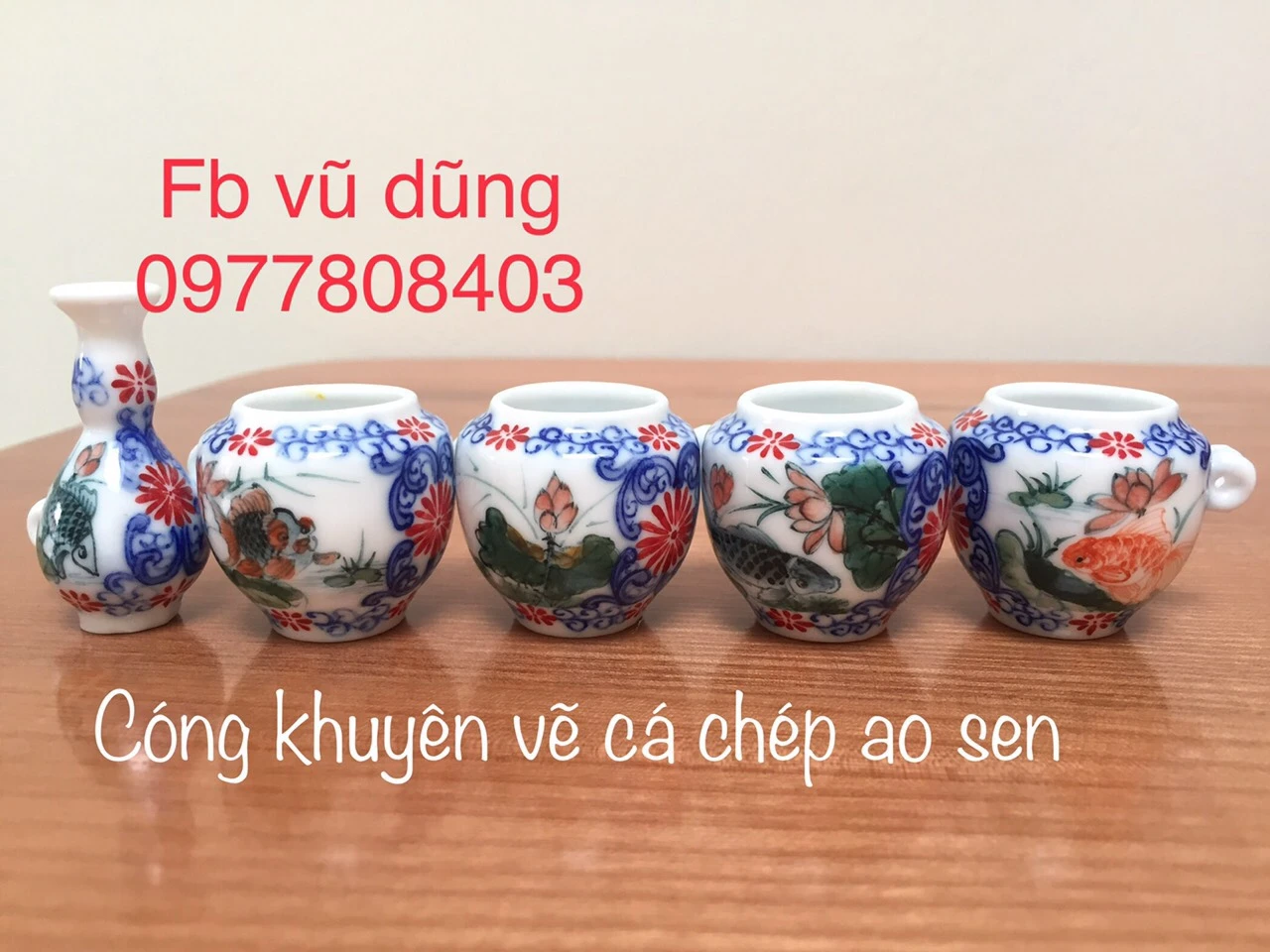 cóng khuyên chum vẽ tích sen cá